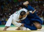 Sherzod Namozov UZB (white) battles with Makoto Hirose JPN in Rio 2016