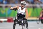 Hannah Cockroft of Great Britain celebrates the victory in the Women's 400m T34 final at Olympic Stadium on day 7 of the Rio 2016 Paralympic Games.