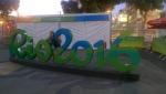 Woman posing in front of Rio 2016 sign