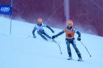 a male Para skier and his guide 