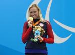 Gold medalist Jessica Long of the United States celebrates on the podium at the medal ceremony for Women's 200m Individual Medley - SM8 at the Rio 2016 Paralympic Games.
