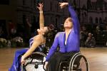 Two dancers in a wheelchair performing