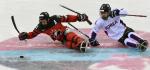two Para ice hockey players contest the puck