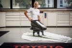 a female Para Nordic skier poses in her new sled