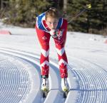a female Para Nordic skier on the snow