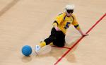 A picture of woman playing Goalball