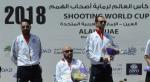 three male Para shooters on a podium