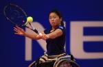 a female wheelchair tennis player
