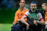 male boccia player David Smith celebrates after throwing the ball