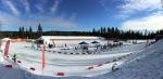 a wide shot of a Nordic skiing course in the sunshine