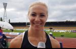 female Para long jumper Karolina Kucharczyk smiles at the camera