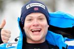 male Para alpine skier Jesper Pedersen smiles and gives a thumbs up to the camera