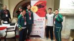 male Para taekwondo fighter Nathan Torquato stands with three other friends