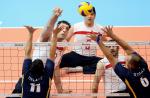a group of male sitting volleyball players on court during a match