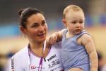 female Para cyclist Sarah Storey holds baby son Charlie