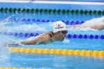 female Para swimmer Mei Ichinose takes a breath during a breaststroke