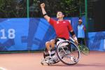 male wheelchair tennis player Shingo Kunieda on a hard court