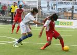 Behzad Zadaliasghari dribbles past Argentinian defender Froilan Padilla