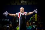 Egyptian powerlifter Sherif Osman opens his arms