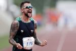 Brazilian sprinter Vinicius Rodrigues screams in joy after a race