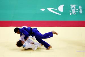 Athletes practicing judo.