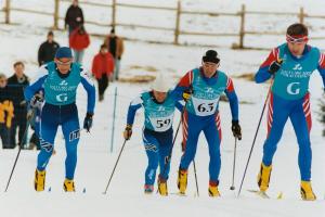 These skiers make their way up the hill during the Men's B2 Short Distance at Soldier Hollow