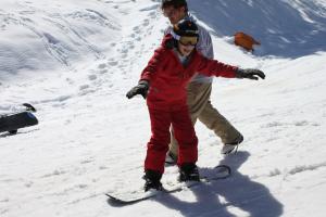 boy on snowboard