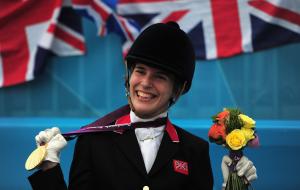 Sophie Christiansen holding gold medal