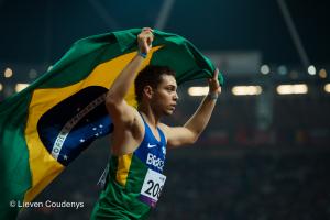 Alan Fonteles Cardoso Oliveira of Brazil waves the Brazilian flag
