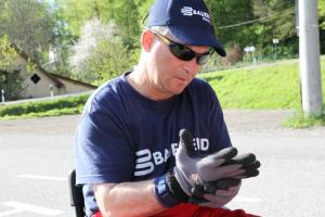 mile putting on gloves