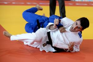 Two judoka on the mat