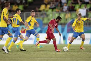 Players of Ukraine fights for the ball with Mehdi Jamali of Iran during the Football 7-a-side Ukraine and Iran Gold Medal Match at the Rio 2016 Paralympic Games.