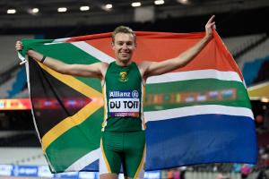 South Africa's Charl Du Toit celebrates winning gold in the men's 200m T37 at London 2017
